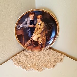 "Confiding in the Den" by Norman Rockwell